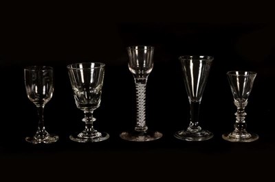 Lot 154 - An 18th century cordial glass with latticino stem and four various other drinking glasses (5)