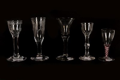 Lot 164 - Five Georgian glasses including three wine glasses on having double series opaque and red twist...