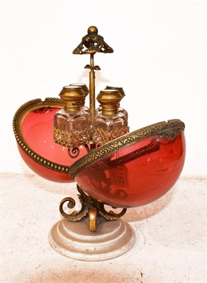 Lot 167 - A 19th century French pedestal scent casket, spherical cranberry glass with gilt metal mounts,...