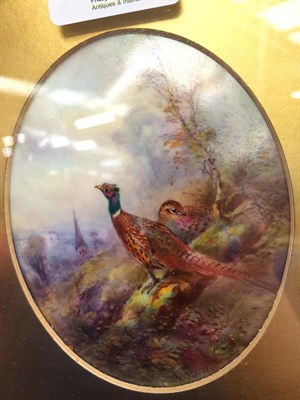 Lot 169 - A Royal Worcester plaque by James Stinton, the oval porcelain plaque painted with pheasants in...