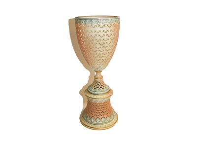 Lot 170 - Grainger & Co Worcester pierced pedestal vase, blush ground with green moulded leaf borders,...