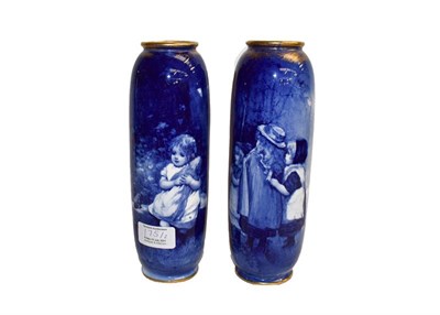 Lot 175 - A pair of Royal Doulton vases from the blue children series with gilt rims, printed marks, 22cm (2)