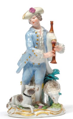 Lot 95 - A Meissen Porcelain Figure of a Shepherd, circa 1750, wearing a yellow tricorn hat, blue jacket and