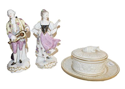Lot 189 - A pair of German porcelain figures in the Meissen style, a Royal Worcester ivory porcelain...