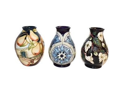 Lot 205 - Three modern Moorcroft vases, Cannon Hall, 13.5cm, Lady Victoria, 14cm and Mountain Gold,...