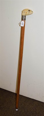 Lot 228 - A Victorian malacca walking stick with silver collar, the ivory handle carved as a Bull Dog...