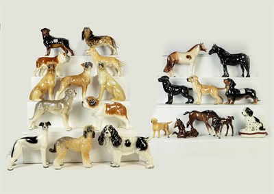 Lot 239 - Beswick Dales Pony ''Maisie'', model No. 1671, black gloss, three Beswick foals in brown gloss...