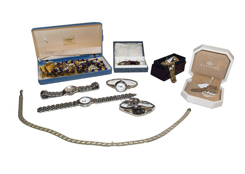 Lot 262 - A quantity of costume jewellery including a silver key pendant, amethyst brooches,...