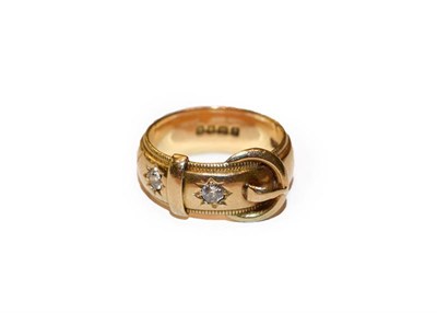 Lot 275 - An 18 carat gold diamond buckle ring, finger size S1/2