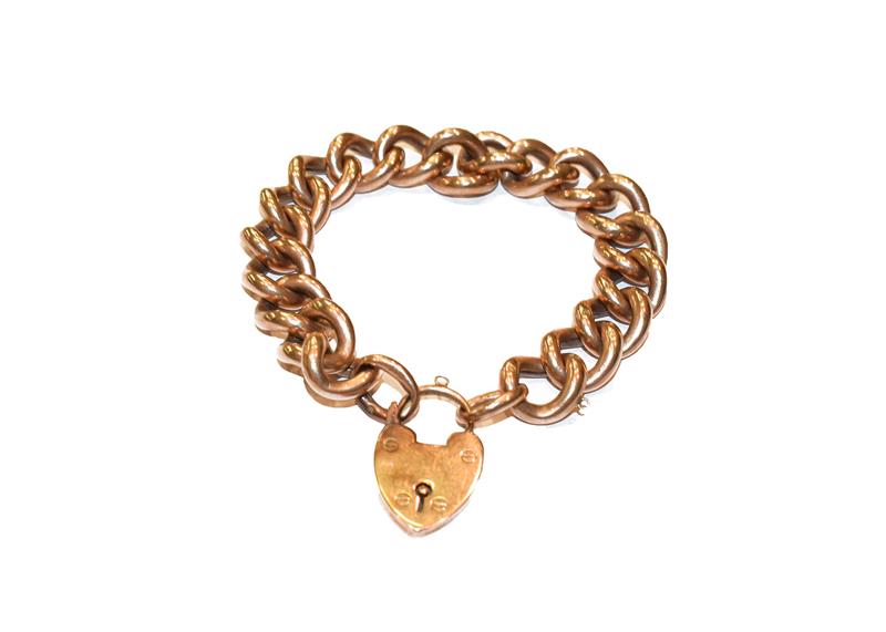 Lot 287 - A curb link bracelet, each link stamped '9', with a heart shaped padlock, length 21cm
