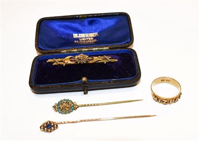 Lot 303 - A Mizpah ring, stamped '18CT', finger size N; a 15 carat gold brooch, length 4.5cm; and two...