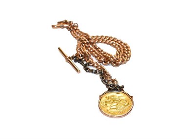 Lot 304 - A albert chain, stamped '9' and '.375', length 41cm, supporting a sovereign dated 1907 as a pendant