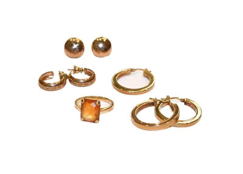 Lot 311 - A citrine ring, finger size M; three pairs of 9 carat gold earrings; and a 9 carat gold odd earring