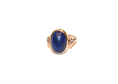 Lot 314 - A 9 carat gold lapis lazuli ring, finger size N1/2