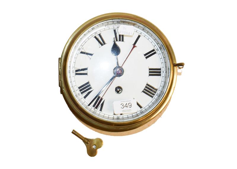 Lot 349 - A brass cased ships bulkhead timepiece with centre seconds and enamel dial, 24cm dia.