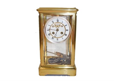Lot 359 - A brass four glass striking mantle clock, circa 1890, 31cm high with twin tube mercury pendulum