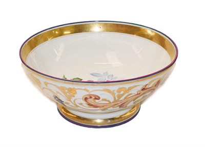 Lot 367 - A 19th century Paris porcelain punch bowl gilded and enamelled with arabesques incorporting baccant