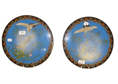 Lot 373 - A pair of Japanese Meiji period cloisonne chargers, with blue ground decorated with cranes and...