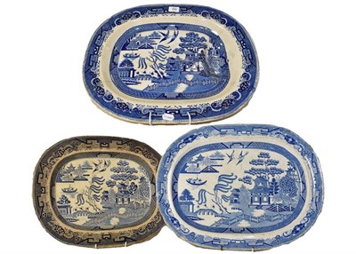 Lot 390 - A large 19th century Staffordshire blue and white meat plate with moulded tree and well...
