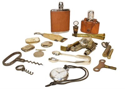 Lot 392 - A tray of assorted items including silver vesta case and sugar tongs, 19th century corkscrews,...