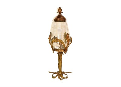 Lot 397 - A French ormolu and glass lamp with ribbon and foliate swag detail, 55cm high
