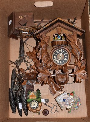 Lot 402 - A carved and painted Black Forest cuckoo clock and three similar timepieces (one box)