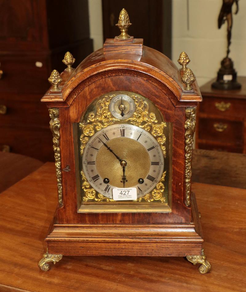 Lot 427 - An oak cased quarter mantle clock, circa 1890, 41cm high, striking on two gongs movement back...