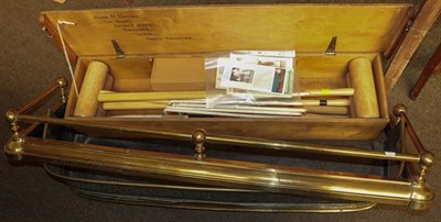 Lot 436 - A cased croquet set together with a pierce brass fire fender and another extending brass fire...
