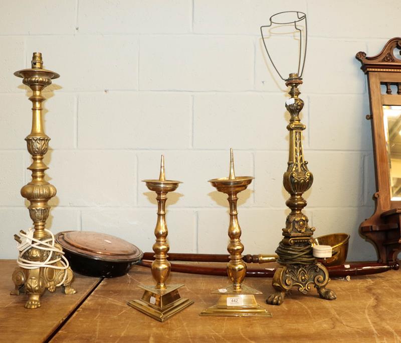 Lot 442 - A pair of 19th century brass candle prickets, two other metal table lamp bases, a copper...