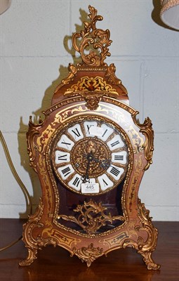 Lot 445 - A modern gilt metal mounted boulle type striking table clock