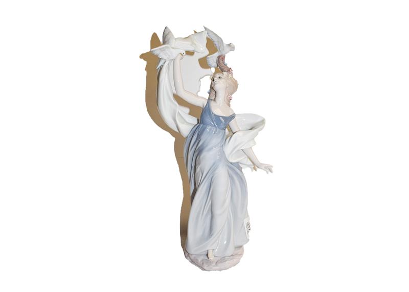 Lot 447 - A boxed Lladro figure titled new horizons, 38cm