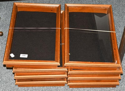 Lot 458 - Eight glazed wooden framed collectors bijouterie cases, 99cm by 47cm