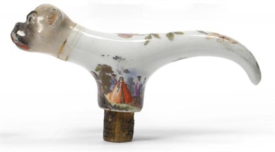 Lot 124 - A Meissen Porcelain Cane Handle, circa 1750, with pug dog terminal, painted with holzshnitt...