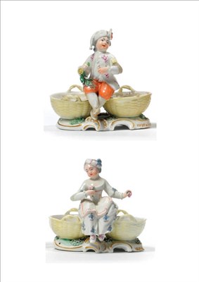 Lot 130 - A Pair of Frankenthal Porcelain Figural Salts, circa 1776, as a boy and girl sitting between a pair