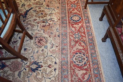Lot 1078 - Oriental Carpet, the cream field of scrolling tendrils flowers and plants around a medallion framed