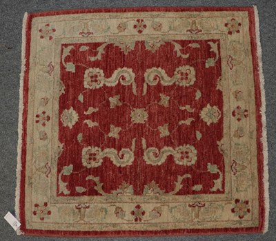 Lot 1083 - Afghan 'Ziegler' rug, the shaded field of large serrated leaves and plants enclosed by cream...