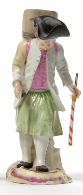 Lot 133 - A Frankenthal Figure of a Vintner, circa 1770, wearing a black tricorn hat, a stick in his left...