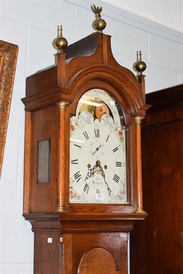 Lot 1095 - An oak eight day longcase clock, 12'' arch painted dial signed Cox, Devizes, the arch with...