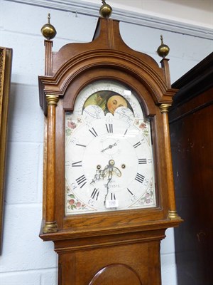 Lot 1095 - An oak eight day longcase clock, 12'' arch painted dial signed Cox, Devizes, the arch with...