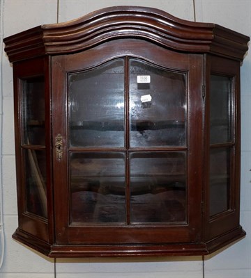 Lot 1100 - An early 20th century mahogany hanging display cabinet with astrigal glazed doors, 80cm by 33cm...
