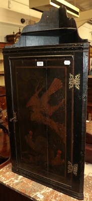 Lot 1124 - A Georgian chinoissere lacquered hanging corner cupboard decorated with cockrels, 54cm by 28cm...