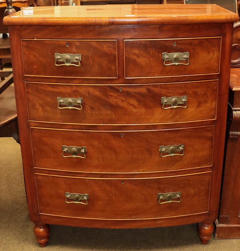 Lot 1140 - A Victorian mahogany four-height bow-front chest of drawers, 102cm by 51cm by 125cm