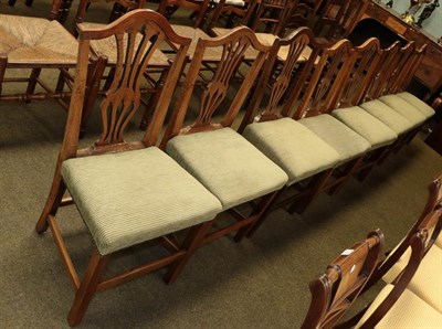 Lot 1151 - A set of eight Georgian oak Hepplewhite style dining chairs, recently re-upholstered (8)