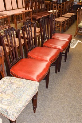 Lot 1159 - A set of four early 19th century mahogany dining chairs, the back rest with Price of Wales...