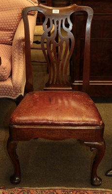 Lot 1165 - A George II red walnut side chair with pierced baluster shaped splat, raised on plain cabriole...