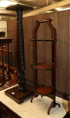 Lot 1187 - A mahogany jardiniere stand with barley twist and acanthus carved column, plinth base with a...