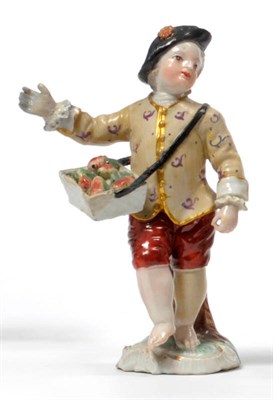 Lot 144 - A German Porcelain Figure of a Fruit Seller, probably Frankenthal, circa 1770, standing wearing...