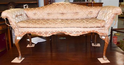 Lot 1212 - Silk upholstered window seat with scroll arms and raised on shell carved cabriole supports,...