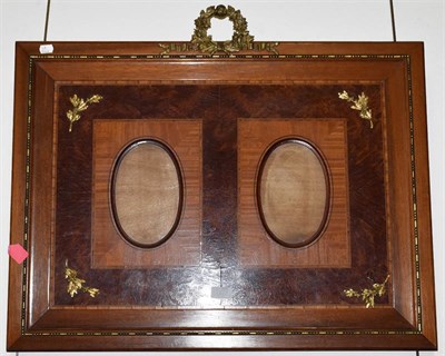 Lot 1233 - A 20th century yew wood and mahogany double picture frame with gilt metal mounts, 58cm by 77cm...