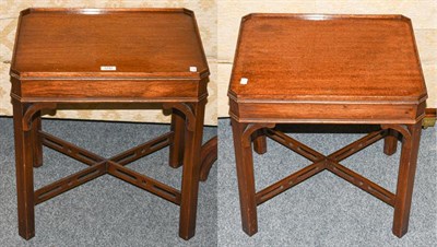 Lot 1242 - A pair of mahogany dish topped lamp tables, with canted corners, square supports, and X framed...